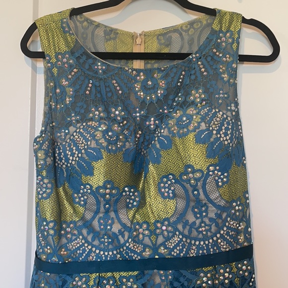 Beautiful Jovani peacock colored dress with embellishments. Worn once. - Picture 5 of 8